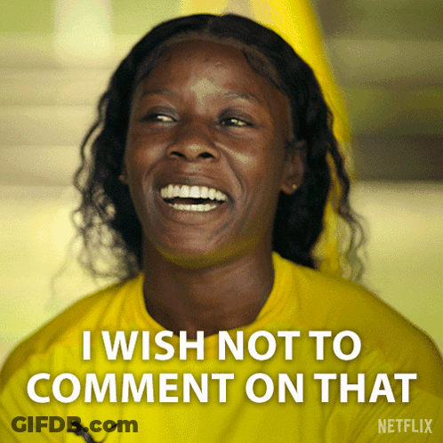 A Woman In A Yellow Shirt Is Laughing And Says I Wish Not To Comment On That GIF