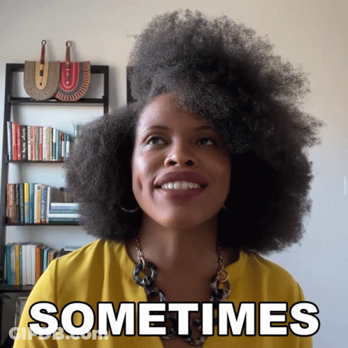 A Woman In A Yellow Shirt Is Smiling With The Words Sometimes Above Her GIF