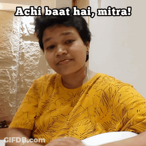A Woman In A Yellow Shirt With The Words Achi Baat Hai Mitra GIF