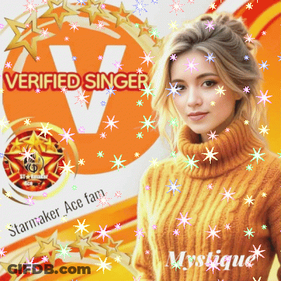 A Woman In A Yellow Sweater Stands In Front Of A Verified Singer Sign GIF