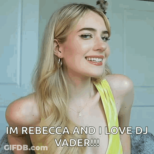 A Woman In A Yellow Top Is Smiling And Says Im Rebecca And I Love Dj Vader GIF