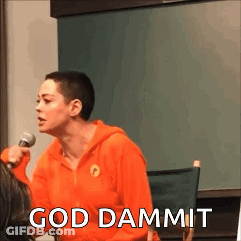 A Woman In An Orange Hoodie Is Holding A Microphone And The Words God Dammit Are Above Her GIF