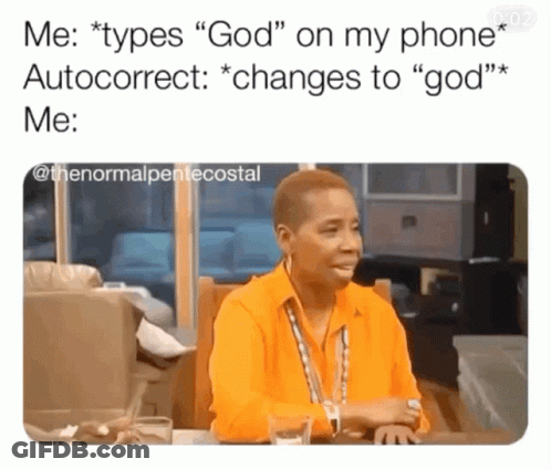 A Woman In An Orange Shirt Is Sitting At A Table Talking To Someone GIF