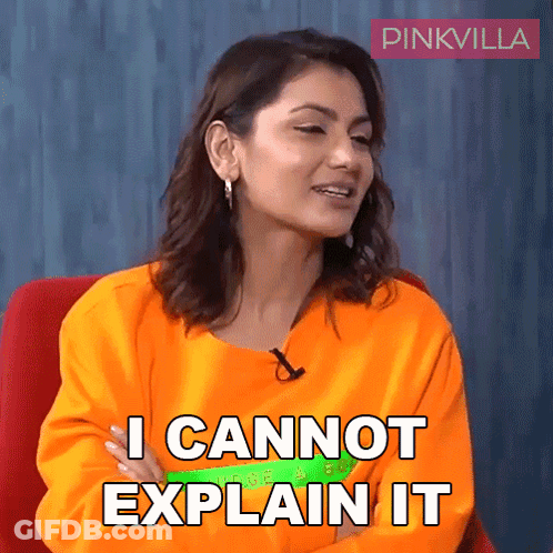 A Woman In An Orange Shirt Is Sitting In A Chair And Says I Cannot Explain It GIF