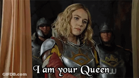 A Woman In Armor Says " I Am Your Queen " In Front Of A Group Of Men In Armor GIF