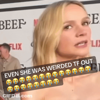 A Woman In Front Of A Sign That Says Beef GIF