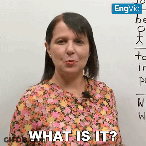 A Woman In Front Of A White Board Says " What Is It " GIF