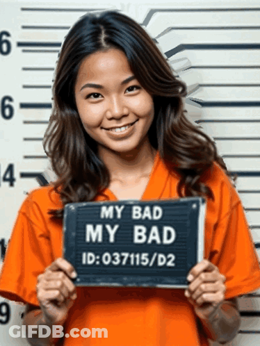 A Woman In Orange Holding A Sign That Says My Bad GIF