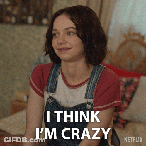 A Woman In Overalls Says I Think I 'M Crazy In A Netflix Advertisement GIF