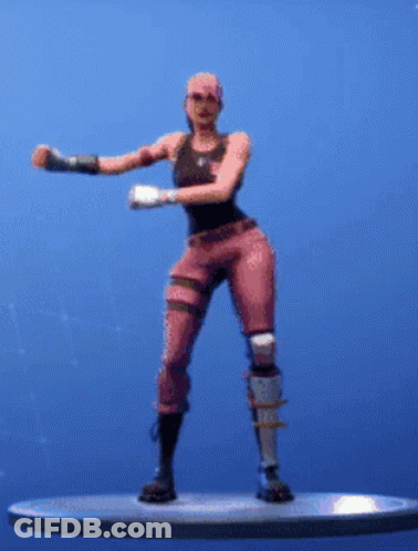A Woman In Pink Pants And A Black Tank Top Is Dancing On A Platform . GIF