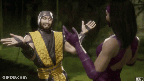 A Woman In Purple Gloves Is Hugging A Man In A Yellow Suit GIF