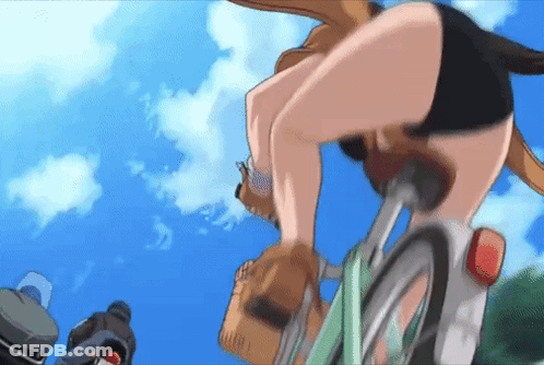 A Woman In Shorts Is Riding A Bike With A Backpack On Her Back GIF