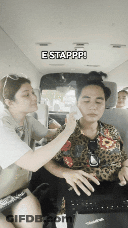 A Woman Is Applying Makeup To A Man 'S Face And The Caption Says E Stappp ! GIF