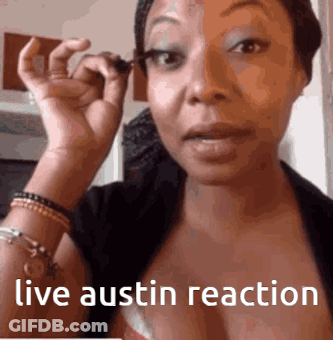 Woman Applying Mascara With Live Austin Reaction GIF