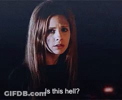 A Woman Is Asking Is This Hell ? In A Dark Room . GIF