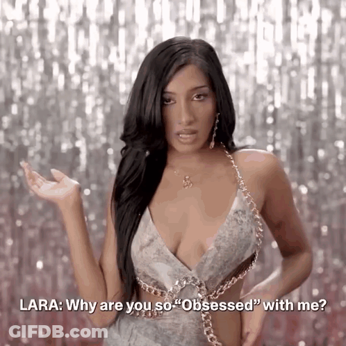 A Woman Is Asking Lara Why Are You So " Obsessed " With Me GIF