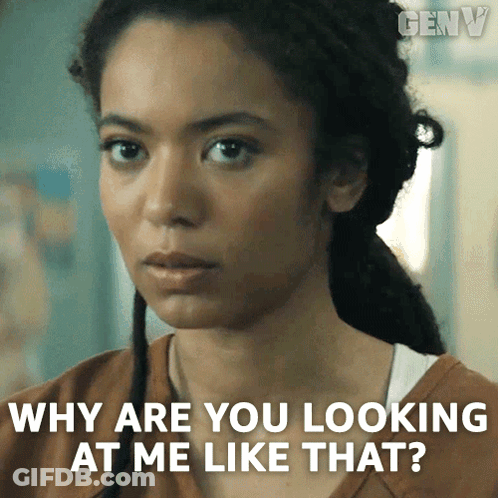 A Woman Is Asking Why Are You Looking At Me Like That ? GIF