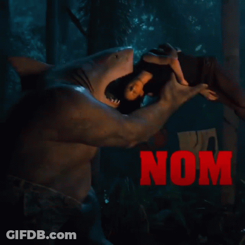 A Woman Is Being Attacked By A Shark With The Words Nom Nom In Red Letters GIF