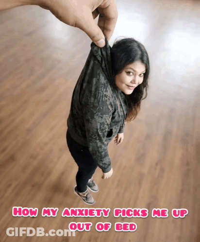 A Woman Is Being Held Up By A Hand With The Caption How My Anxiety Picks Me Up Out Of Bed Below Her GIF