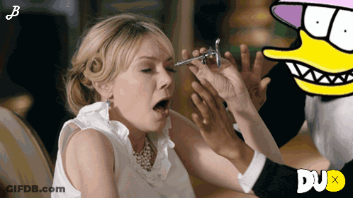 Woman Injected By Man With Cartoon Duck Behind GIF