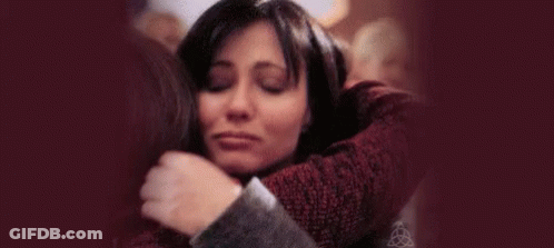 A Woman Is Being Touched By A Man 'S Hand In A Blurry Photo . GIF