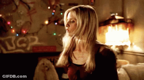 Woman Blowing Kiss In UCR Room GIF