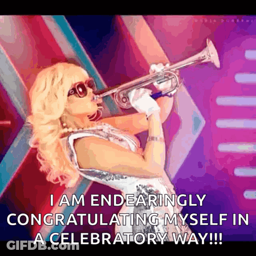 A Woman Is Blowing A Trumpet And Says I Am Endearingly Congratulating Myself In A Celebratory Way GIF