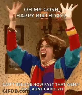 A Woman Is Celebrating Her Birthday With Her Arms In The Air And A Funny Caption . GIF