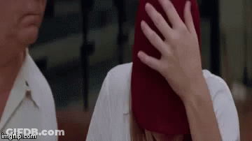 Woman Covering Face With Hand GIF