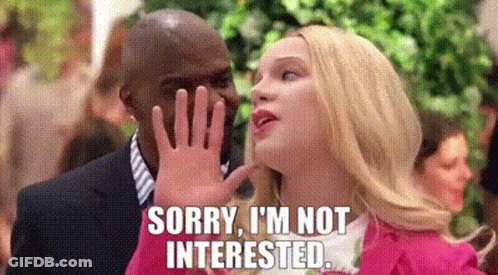 A Woman Is Covering Her Face With Her Hand While A Man Says `` Sorry , I 'M Not Interested `` . GIF