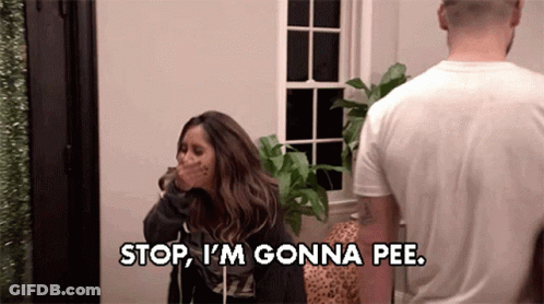 A Woman Is Covering Her Mouth While A Man Says Stop I 'M Gonna Pee GIF