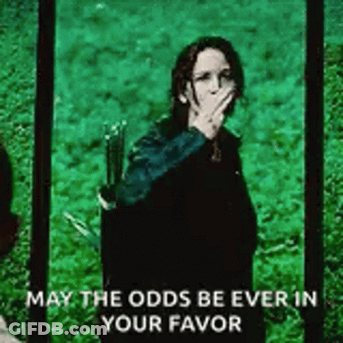 A Woman Is Covering Her Mouth With Her Hand While Holding A Bow And Arrow In Her Hand . GIF
