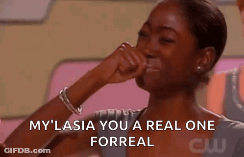 A Woman Is Covering Her Mouth With Her Hand While Laughing And Saying `` My Lasia You A Real One Forreal '' . GIF