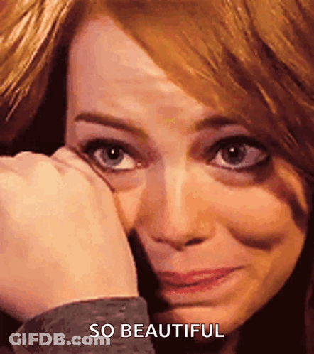 A Woman Is Crying And Covering Her Face With Her Hand And The Words So Beautiful Are Above Her GIF