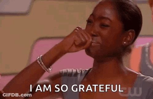 A Woman Is Crying And Covering Her Face With Her Hand . GIF