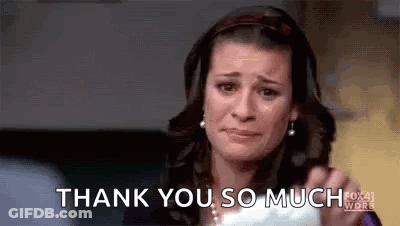 A Woman Is Crying And Holding A Piece Of Paper With The Words `` Thank You So Much '' Written On It . GIF
