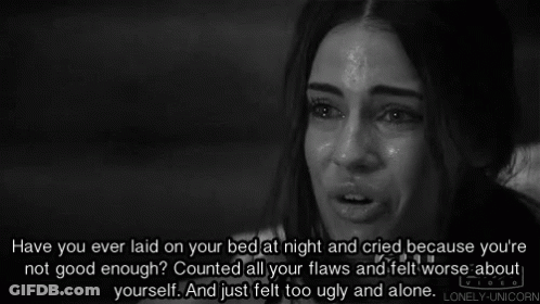 A Woman Is Crying In A Black And White Photo With A Quote From Lonely Unicorn GIF