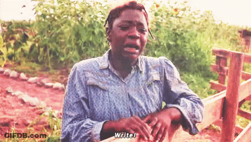 A Woman Is Crying In Front Of A Wooden Fence And Says " Writel " GIF