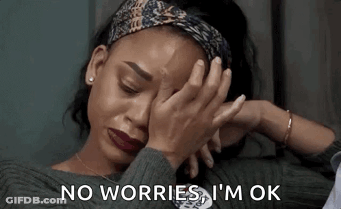 A Woman Is Crying While Covering Her Face With Her Hands And Says `` No Worries , I 'M Ok '' . GIF