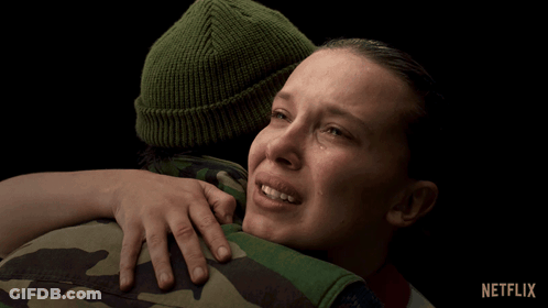 A Woman Is Crying While Hugging A Man With Netflix Written On The Bottom Right GIF