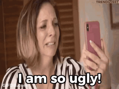 A Woman Is Crying While Looking At Her Phone And Says I Am So Ugly . GIF