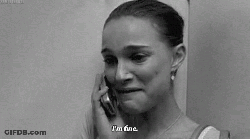 A Woman Is Crying While Talking On A Cell Phone And Says `` I 'M Fine '' . GIF