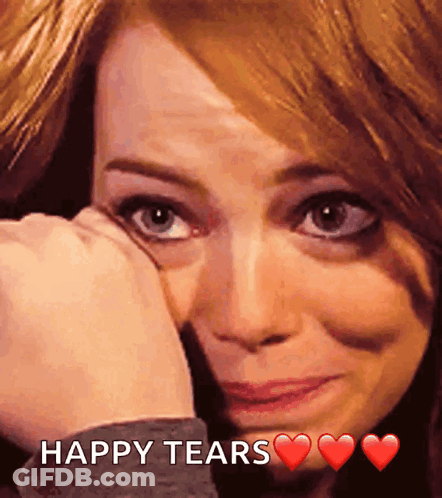 A Woman Is Crying With The Words Happy Tears Written Below Her GIF