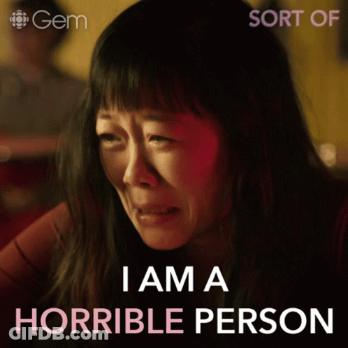A Woman Is Crying With The Words I Am A Horrible Person Behind Her GIF