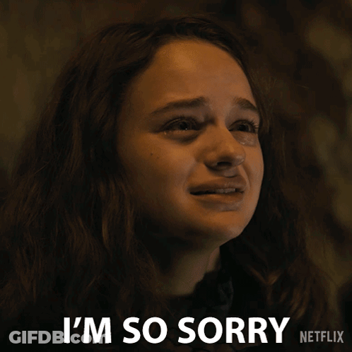 A Woman Is Crying With The Words I 'M So Sorry Behind Her GIF