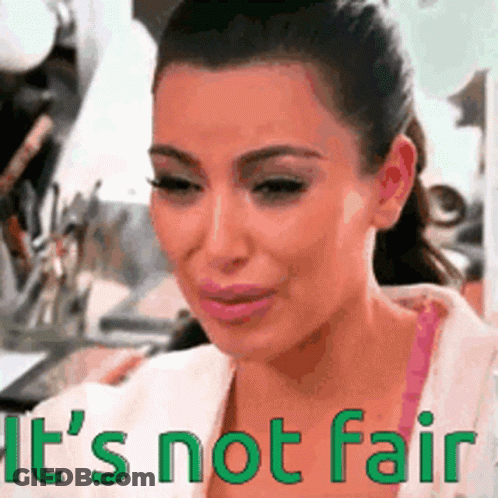 A Woman Is Crying With The Words " It 'S Not Fair " In Green Letters GIF