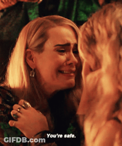 A Woman Is Crying With The Words You 'Re Safe Next To Her GIF