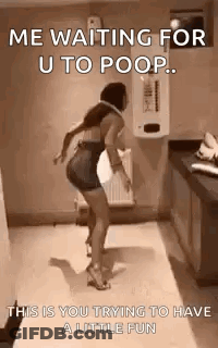 A Woman Is Dancing In A Bathroom And Waiting For U To Poop . GIF