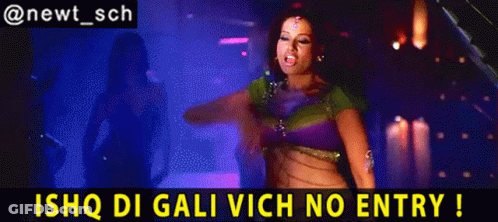 A Woman Is Dancing In A Dark Room With The Words Ishq Di Gali Vich No Entry Below Her GIF