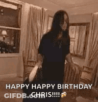 A Woman Is Dancing In A Living Room With The Words `` Happy Happy Birthday Chris '' Written On The Screen . GIF